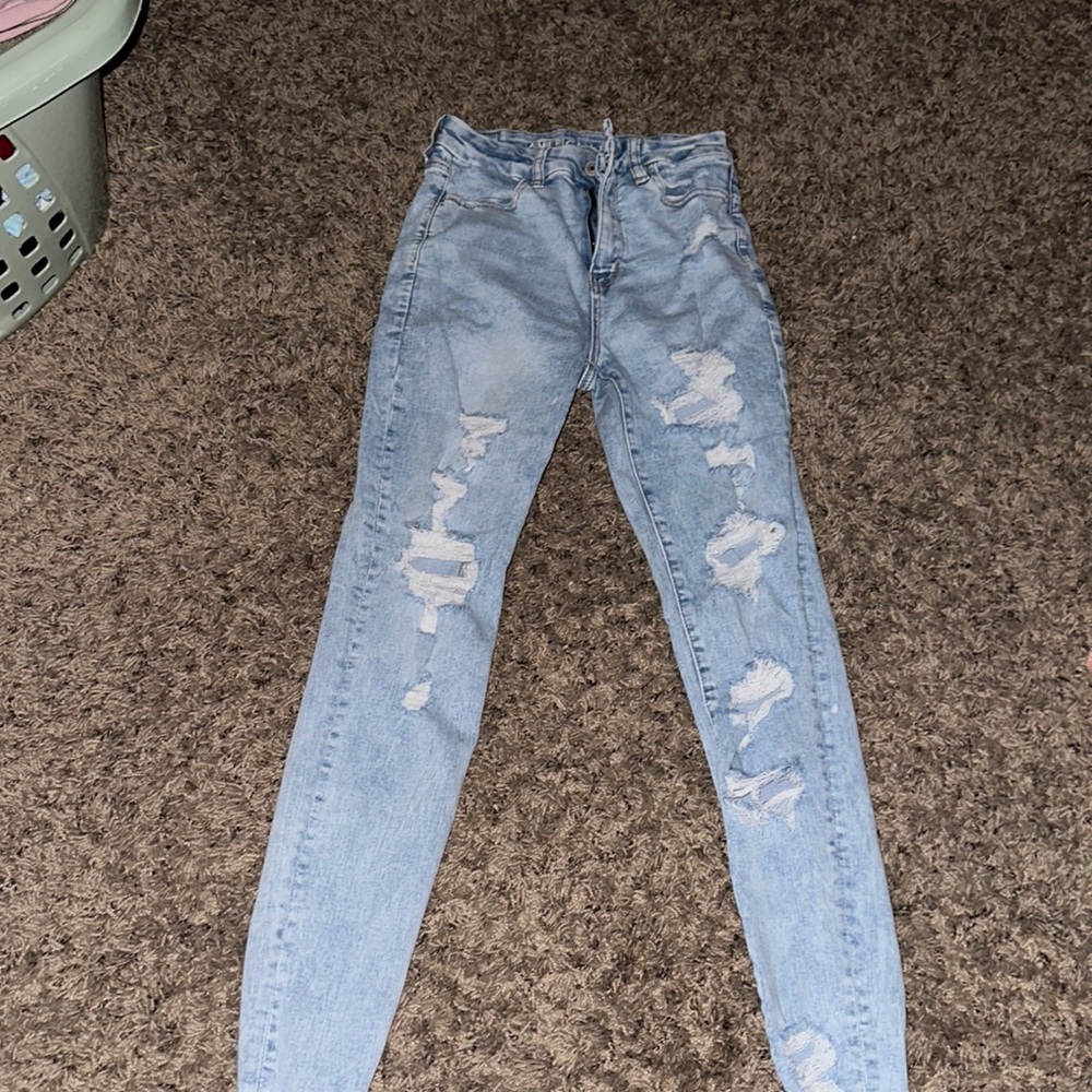 light washed high waisted ripped American Eagle skinny jeans